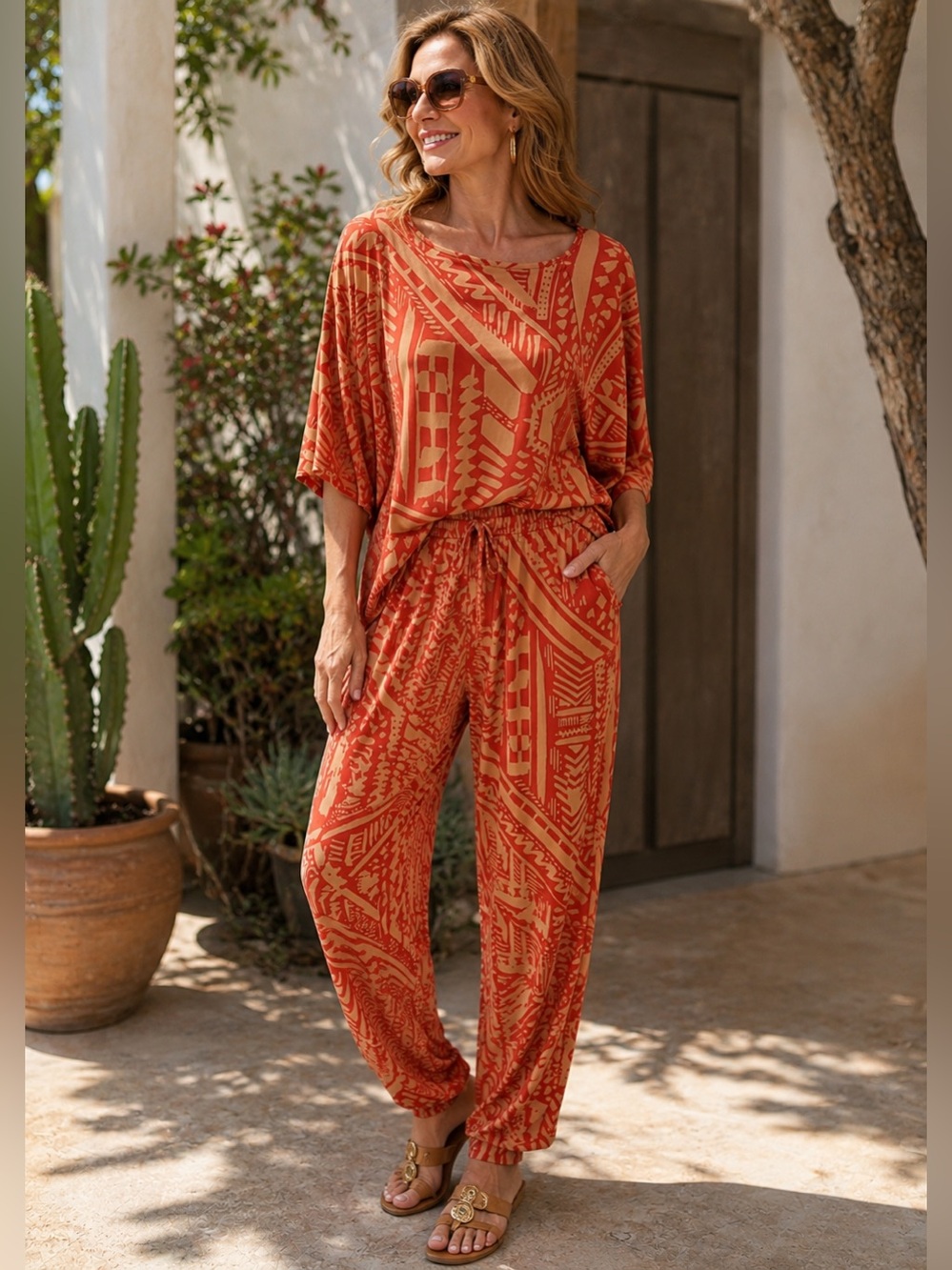 IMAN Orange And Tan Geometric Print Leggings & Cape Top Set